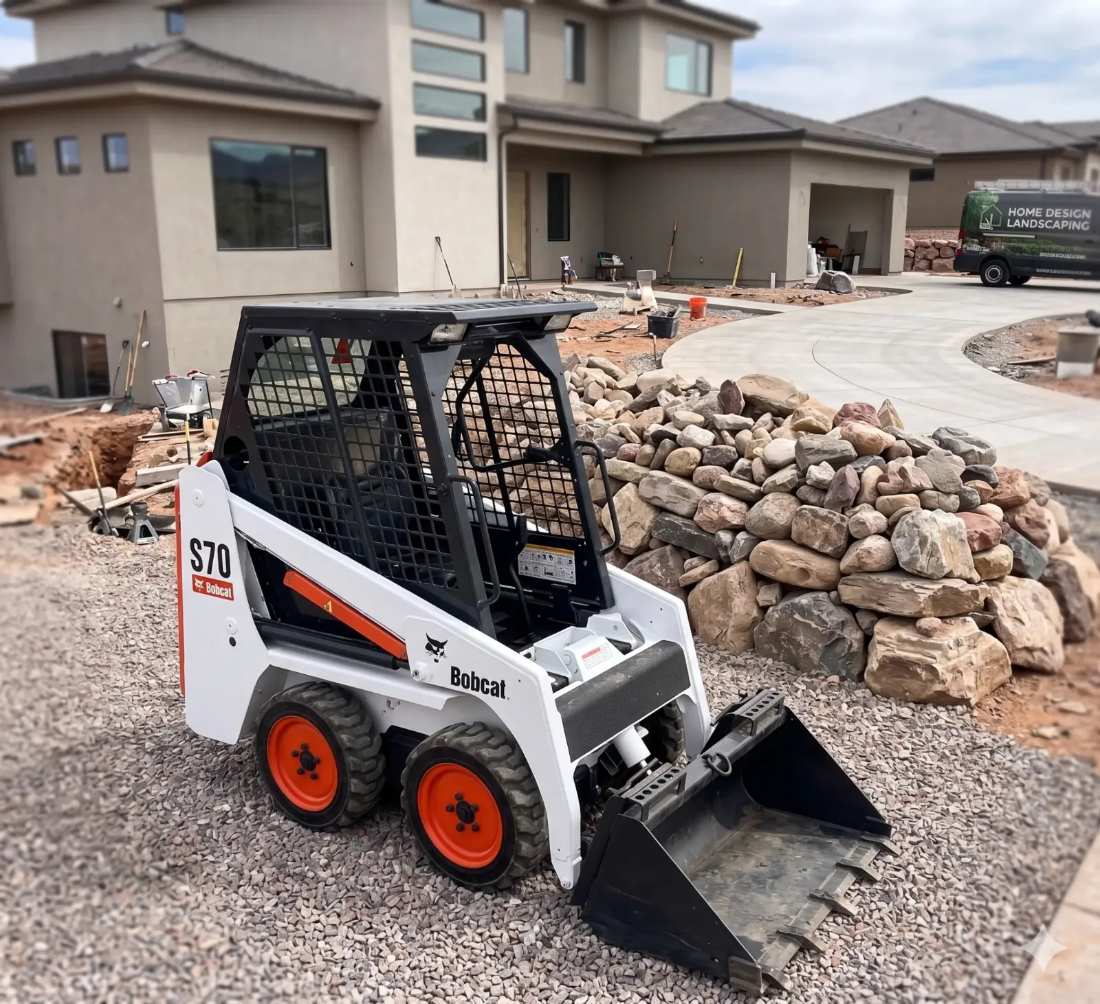 Bobcat S70 compact skid steer rental from Desert Loader Rentals on a job site